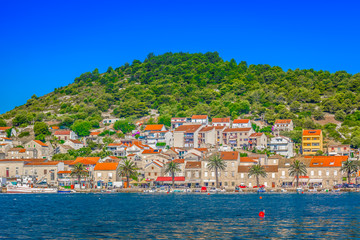 Vis island summer landscape. / Seafront view at picturesque ancient village on Island Vis, summertime in Croatia, Europe.
