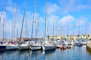 Fototapeta na wymiar Boats in port of Puero de Mogan on Gran Canaria.