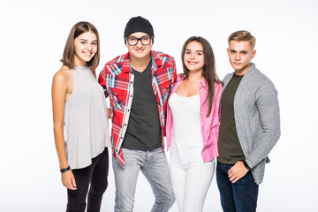 Obraz premium Portrait of young casual people with arms folded over white background
