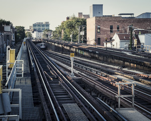 Naklejka premium Tracks cutting through a residential area