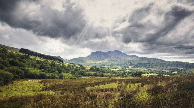 Sun Rays over Scenic Mountainous Landscape of North Wales