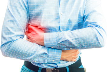 Man is holding his rib. Isolated on white background. Over working, tired, unhealthy.