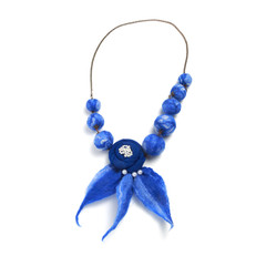 Beads handmade consisting of felt balls and a blue fabric flower on a white background
