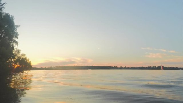 sunset over lake in summer timelapse