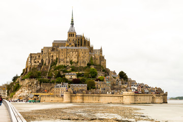 Fototapeta na wymiar Le Mont-Saint-Michel, off the country's northwestern coast, at the mouth of the Couesnon River near Avranches in Normandy, France