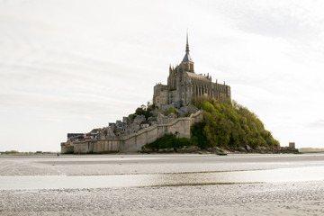 Fototapeta na wymiar Le Mont-Saint-Michel, off the country's northwestern coast, at the mouth of the Couesnon River near Avranches in Normandy, France