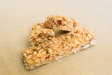 Cereal granola bars against white background. Concept of healthy food eating, fitness, and diet.