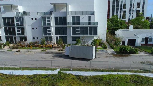 Aerial footage of a commercial truck flipped over from heavy Hurricane Irma winds