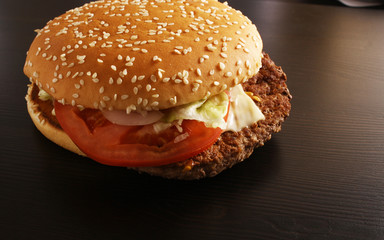 burger cheeseburger on a dark background