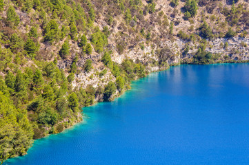 Fototapeta na wymiar The Blue Lake in a dormant volcanic maar - Mount Gambier, SA, Australia