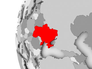Ukraine on grey globe