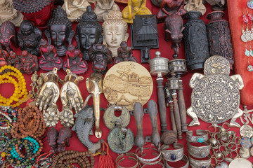 Nepalese traditional handicrafts and souvenirs, Kathmandu, Nepal. Text on the Prayer Wheels -...