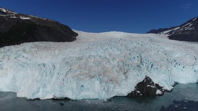 Arial 4k shots of a glacier and it's surroundings in Alaska