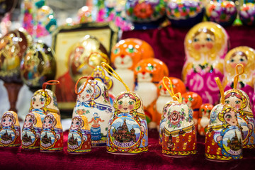 colored matrioskas at the russian shop