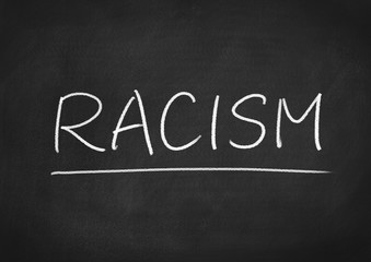 Obraz premium racism concept word on a blackboard background