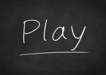 play concept word on a blackboard background