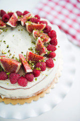 cake with fresh berries and cream