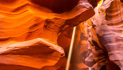 Beautiful, abstract, red rock shapes in Antelope Canyon, on a bright sunny day in summer