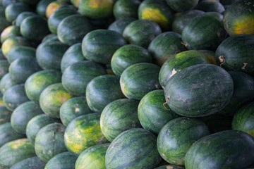 Pile of watermelons in local market store