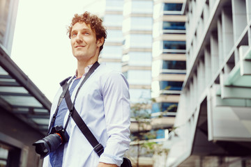 Male tourist in city