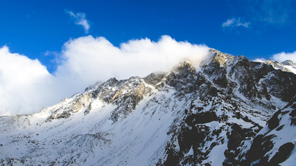 Fototapeta na wymiar The highest peak of Eastern Sayans - Munku-Sardyk 3491