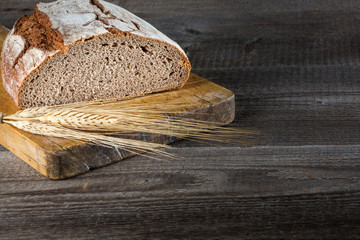 Sliced baked bread on cutting board