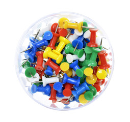 pile of colorful  push pins on isolated white background