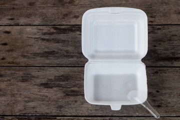 Styrofoam box on wooden background