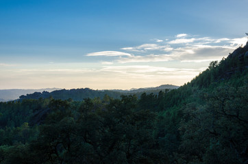 Fototapeta na wymiar Sunset, trees, mountains, way to Poço Azul, National Park of Peneda-Geres, Portugal
