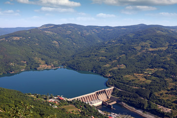 Fototapeta na wymiar hydroelectric power plant on river landscape