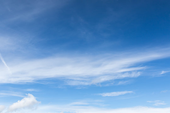 White fluffy clouds in the blue sky