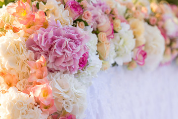 floral wedding decorations pink and white. Garland, candle, lace, bouquet