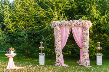 Weddind arch altar on the lawn. Europe ceremony tradition