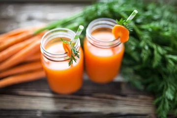 Photo sur Plexiglas Jus Jus de carotte bio frais