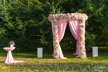 Weddind arch altar on the lawn. Europe ceremony tradition