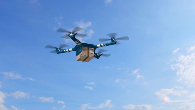 delivery drone - drone delivery a cardboard package on an sunny day with blue sky