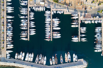 Aerial view of boats and yachts in marina of Portisco, Sardinia, Italy