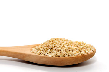 white Sesame on wood spoon on white background