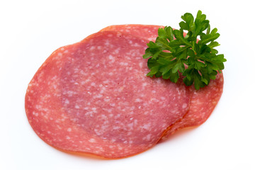 Salami slices isolated on white background.