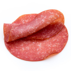 Salami slices isolated on white background.