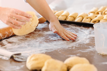 Woman Preparing Dough to Bake