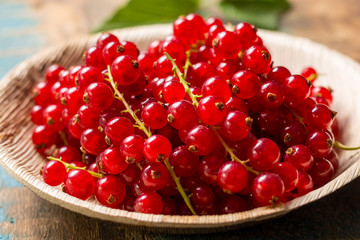 Fresh ripe red currant berries on the table