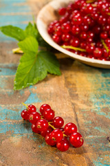 Fresh ripe red currant berries on the table