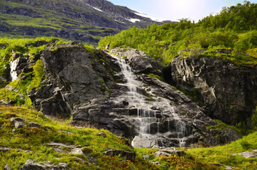 Scenic wild waterfall in Fjordlande (Hjorundfjord), Norway