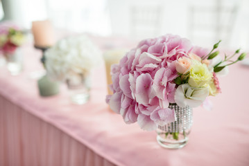 Wedding stylish decor elements in banquet hall closeup