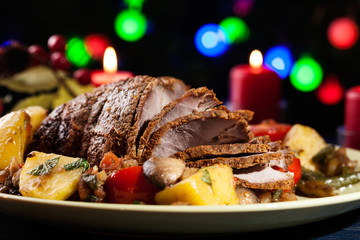 Juicy roast pork on the holiday table