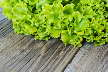Top view of fresh Lettuce on wooden background
