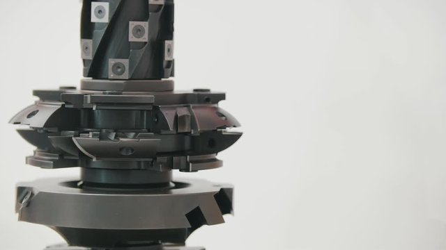 Rotated milling cutter - industrial milling machine cutting metal - copy space