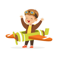 Cute little boy in pilot costume playing toy plane, kid dreaming of piloting the plane vector Illustration