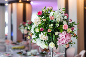 Wedding stylish decor elements in banquet hall closeup